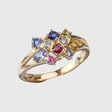 Gold ring with colored crystal