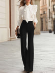 Maria | Conjunto de blusa blanca con lazo y volantes y pantalones negros de pierna ancha