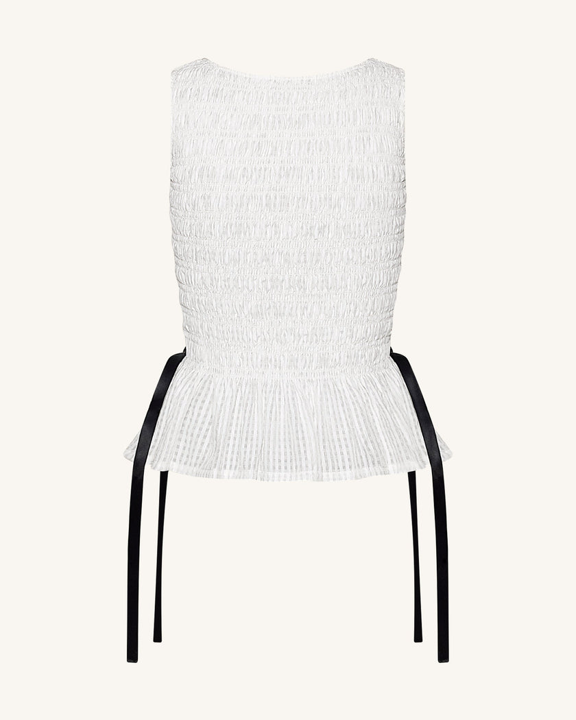 Zoe Top sin mangas peplum frunce elástico blanco detalle del peplum