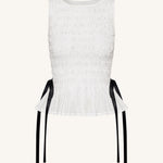 Zoe Top sin mangas peplum frunce elástico blanco vista lateral