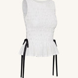 Zoe Top sin mangas peplum frunce elástico blanco vista trasera
