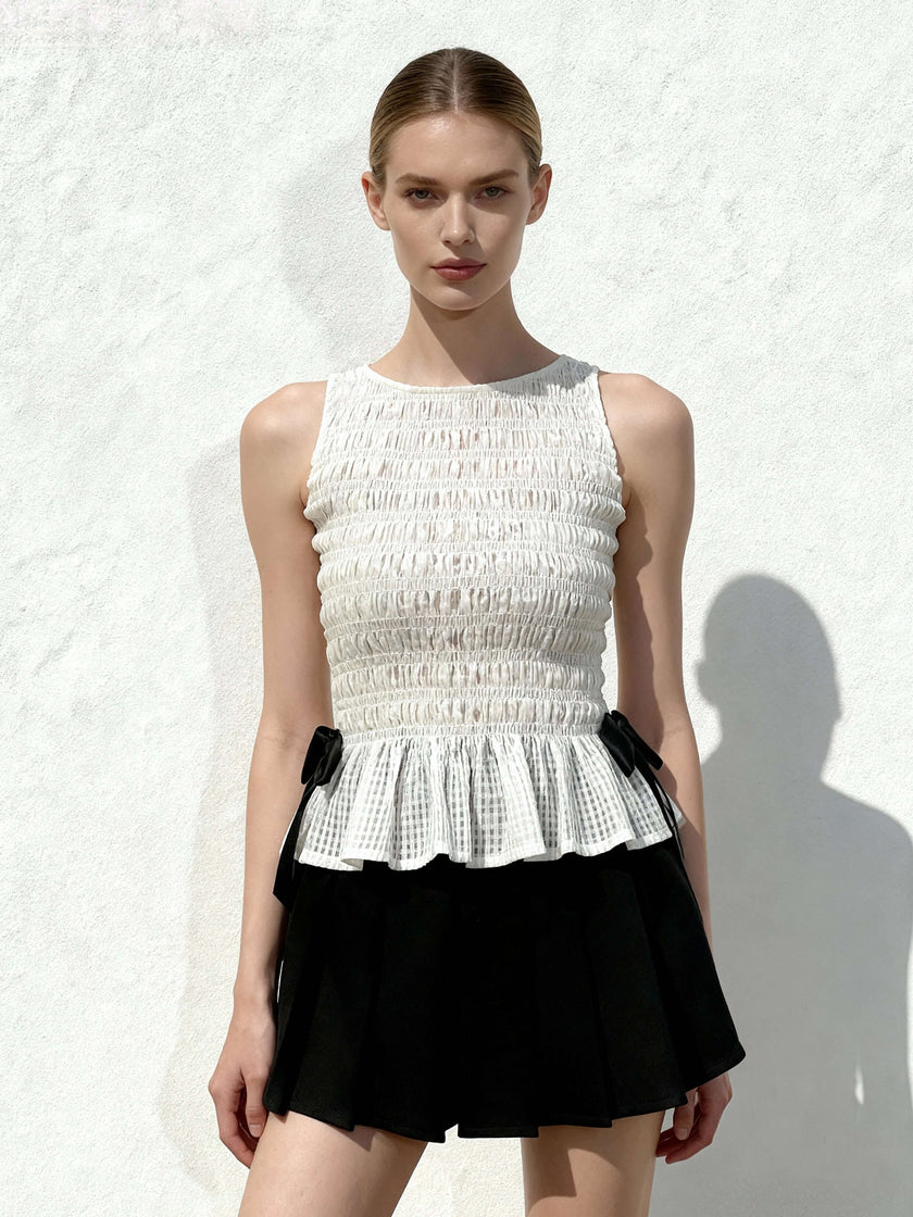 Zoe Top sin mangas peplum frunce elástico blanco vista frontal