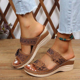 Sandalias cuña con pedrería y flor decorativa