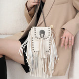 Bolso de hombro Rebel con borlas
