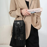 Bolso de hombro Rebel con borlas