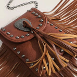 Bolso de hombro Rebel con borlas