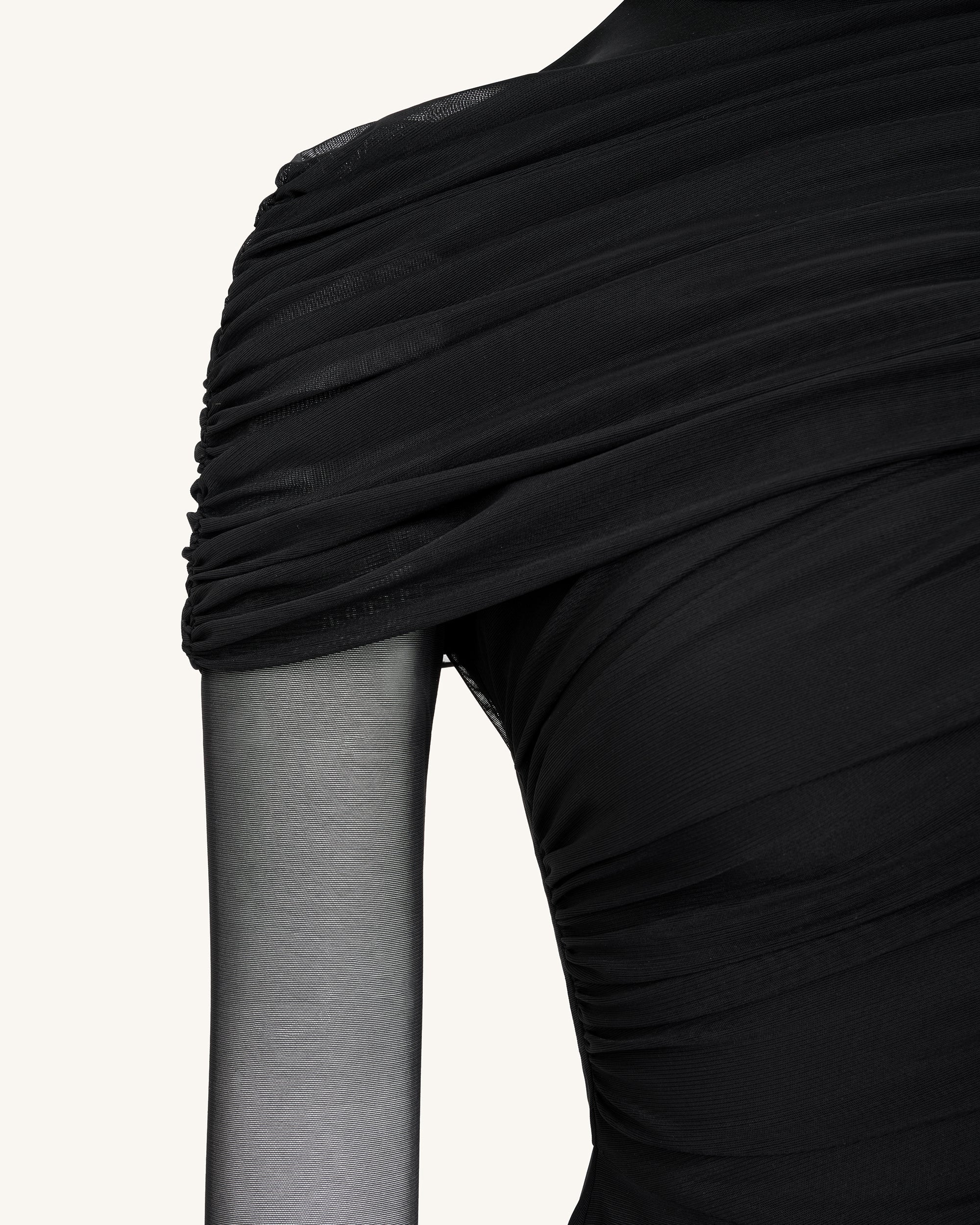 Chloe Top fruncido cuello alto transparente negro look femenino elegante