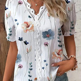Maria | Blusa de encaje floral con mangas abullonadas